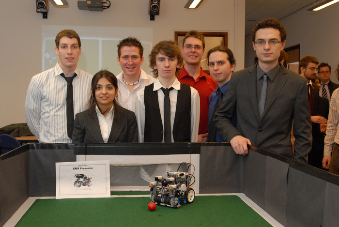 The robot we built, surrounded by the members of my group